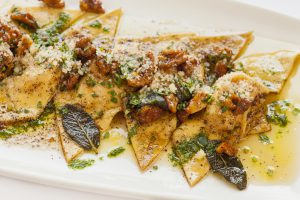 butternut squash ravioli with roasted walnuts, brown butter and sage